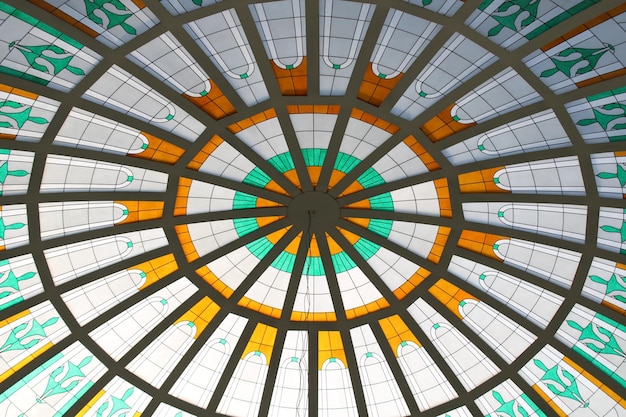 A stained glass ceiling with the number 12 on it