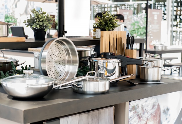 Stainless steel kitchenware on the table