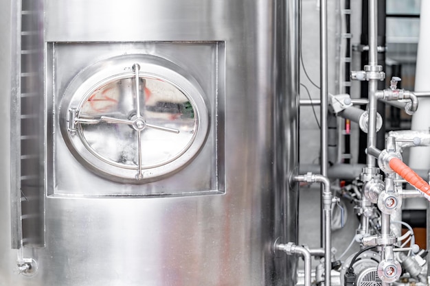 Stainless steel tanks for brewing beer in a brewery