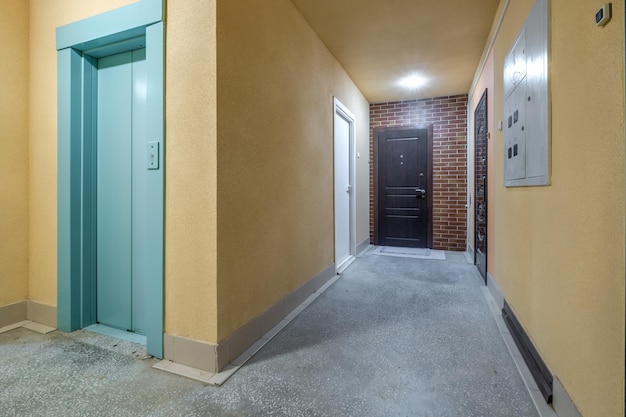 Staircase hall in an apartment building at the entrance to the elevator