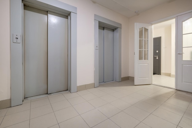 Staircase hall in an apartment building at the entrance to the elevator