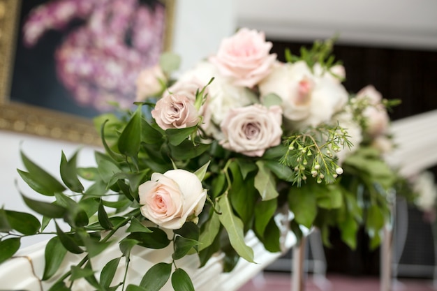 The staircase is decorated with fresh flowers and a plate Wedding. 