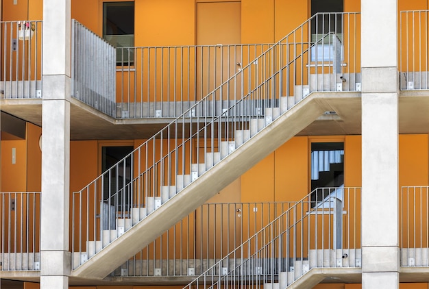 Staircase Outdoor. Facade with Stairs, Railings of Residential Apartmets Building. Fire escape stair