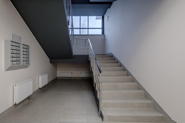 Stairs emergency and evacuation exit stair in up ladder in a new office building