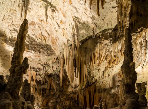 Stalactites and stalagmites underground in cave system in Postojna