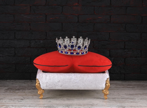 stand with cushion with a crown