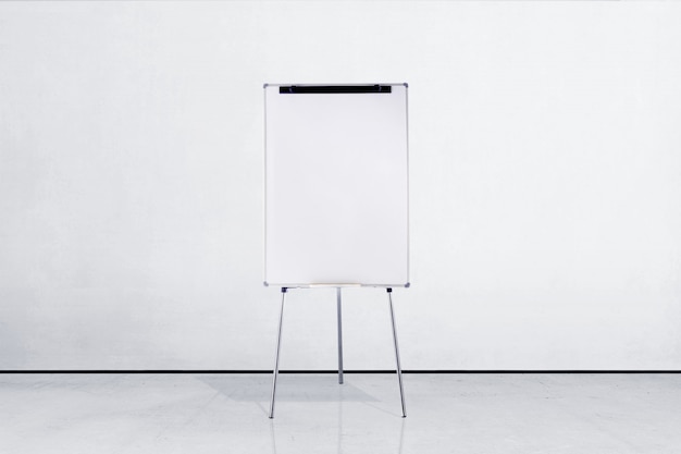 Standing white board inside room 