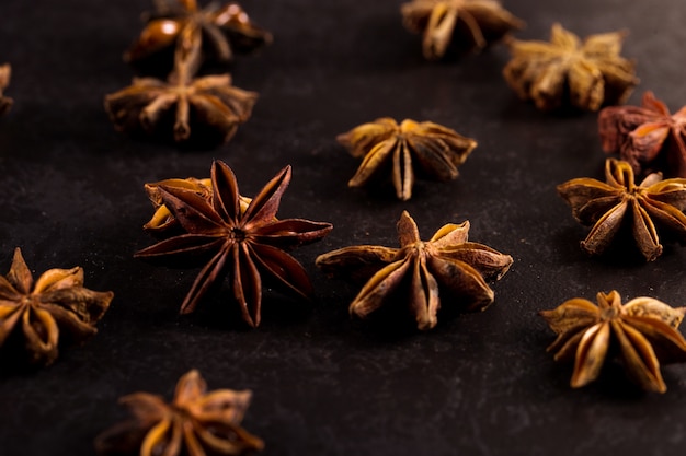 Star anise on black table. , copyspace.