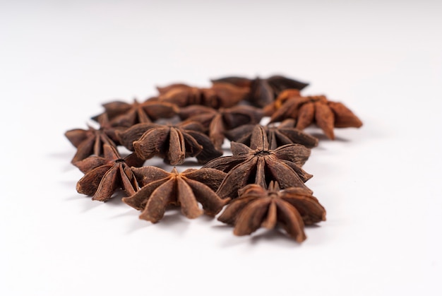 Star anise on white surface