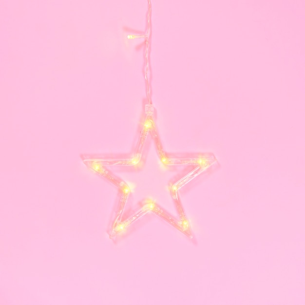 star garland on a pink background