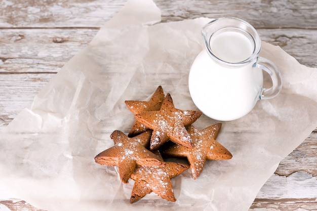 Star shaped gingerbread. Cookies for Santa. Rustic style breakfast.