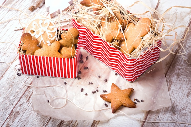 Star shaped gingerbread and gingerman. Homemade cookies. Rustic style breakfast.