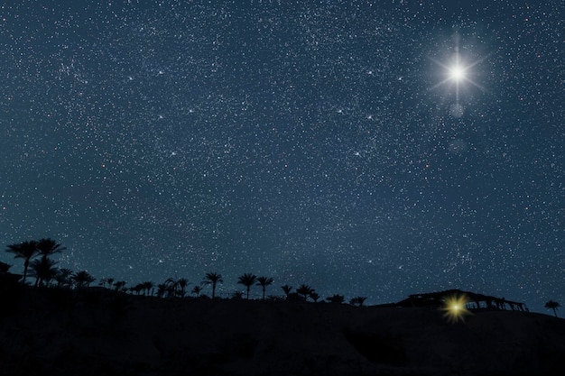 The star shines over the manger of christmas of Jesus Christ panorama