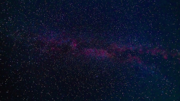 Starry Milky Way at night with stars on the background of a dark blue night sky