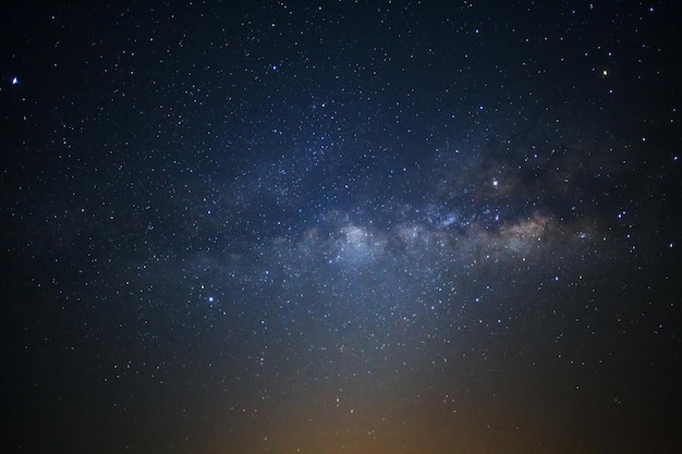 Starry night milky way astronomy Long exposure photographwith grain