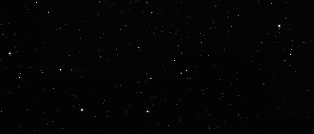 Stars at dark night scenefield bright star on black background