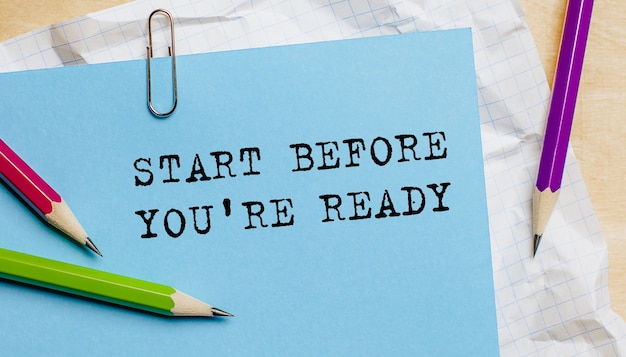 Start before you're ready text written on a paper with pencils in office