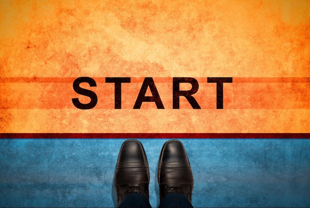 Start Line Start background Top view of Businessman with shoes is standing next to line and word Start Business Challenge or do something new