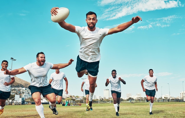 Starting the rugby season off with a bang Shot of a rugby player scoring a try while playing on a field