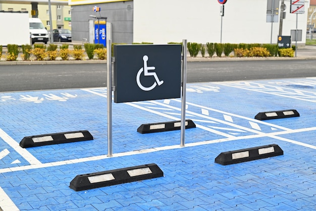 State disability parking spaces with road markings and signage in the urban area