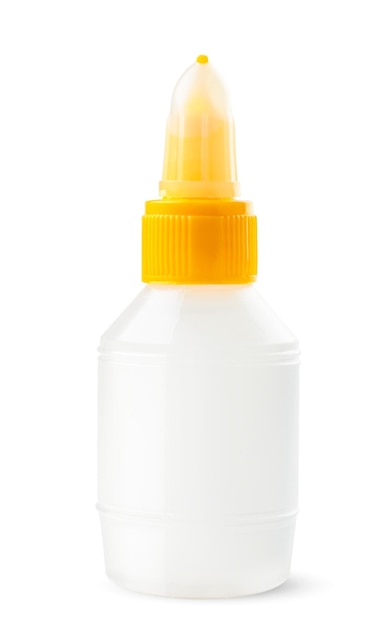 Stationery glue in a plastic bottle close-up on a white background. Isolated