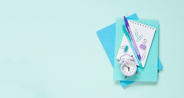 Stationery in pastel colors on a light blue background