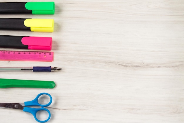 Stationery on wooden background