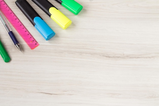 Stationery on wooden background