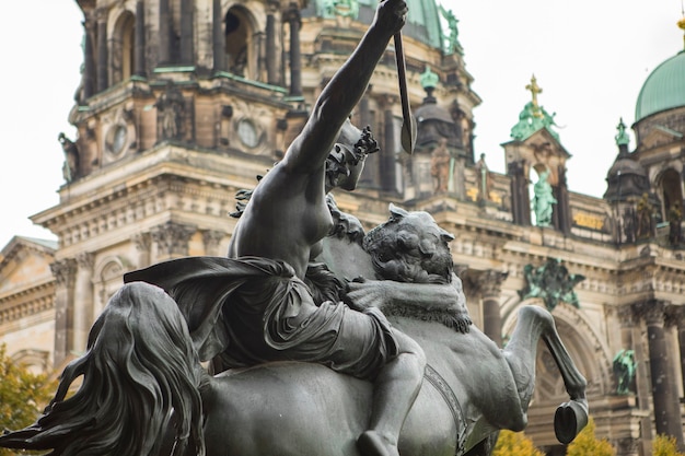 Statue of the goddess of battle in front of the museum on Museum Island, Berlin, Germany