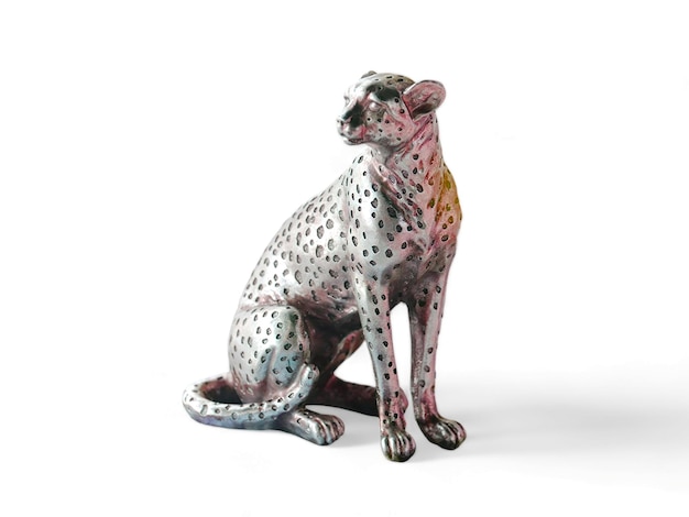 A statue of a leopard with spots on its back