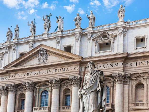 Statue Paul the Apostle and St Peter's Basilica