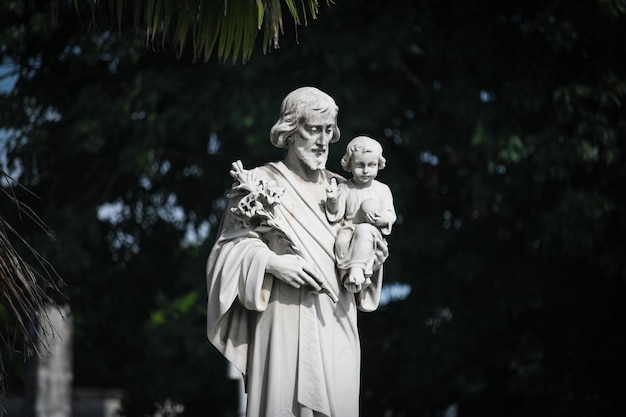 Statue of Saint Joseph holding Jesus