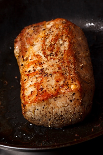 Steak fried in the pan.