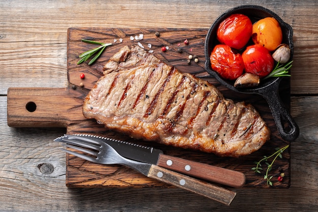 Steak Striploin, grilled with pepper and garlic.