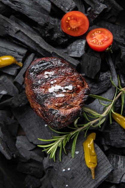 A steak with a pepper on it