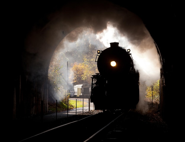 Steam locomotive enters tunnel