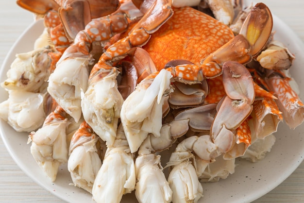 Steamed blue crab with spicy seafood sauce - seafood style