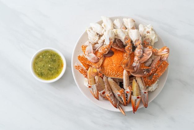 Steamed blue crab with spicy seafood sauce