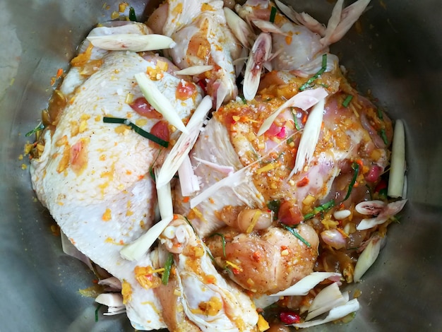 Steamed Chicken in pot with Thai Herbs close up