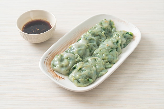 steamed chives dumplings with sauce - Asian food style