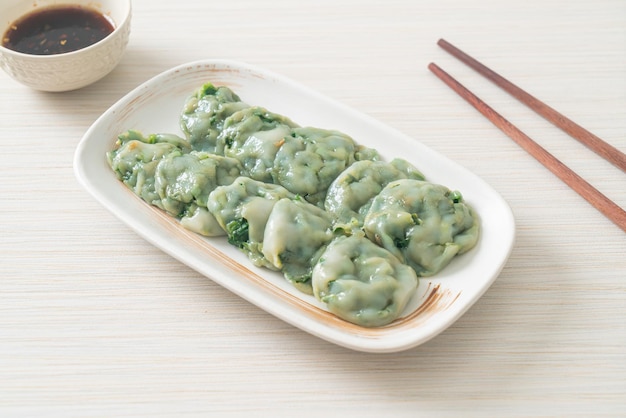 steamed chives dumplings with sauce - Asian food style