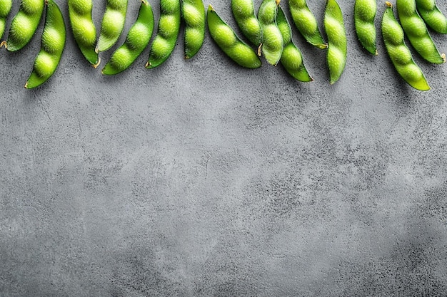 Photo steamed edamame soybeans on a gray concrete background top view copy space