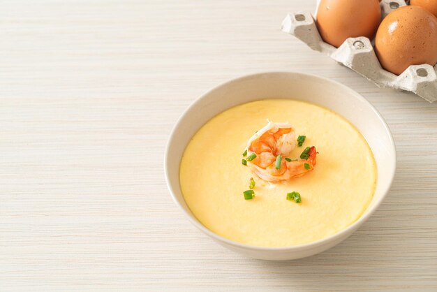 Steamed egg with shrimp and spring onions on top