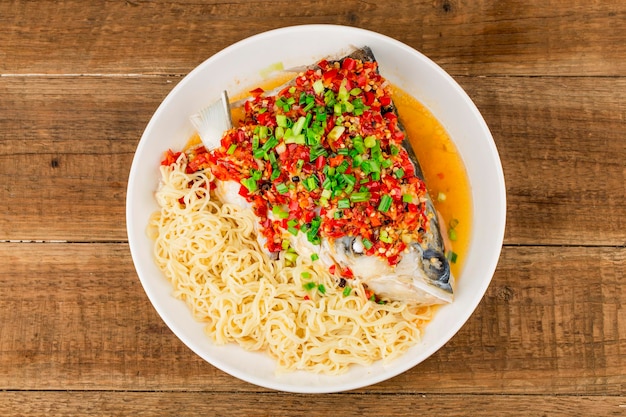 Steamed fish head with diced hot red peppers