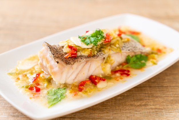 Steamed Grouper Fish Fillet with Chili Lime Sauce in lime dressing