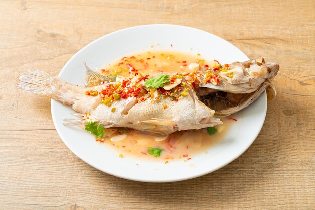 Steamed grouper fish with lime and chillies - Asian food style