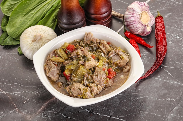 Steamed lamb meat with vegetables and spices