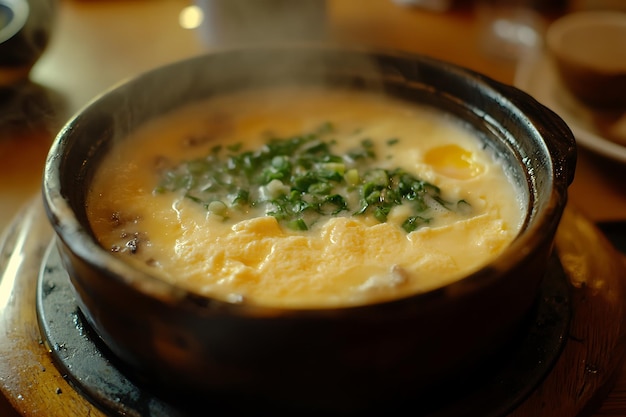 Steaming Bowl of Savory Egg Drop Soup with Scallions