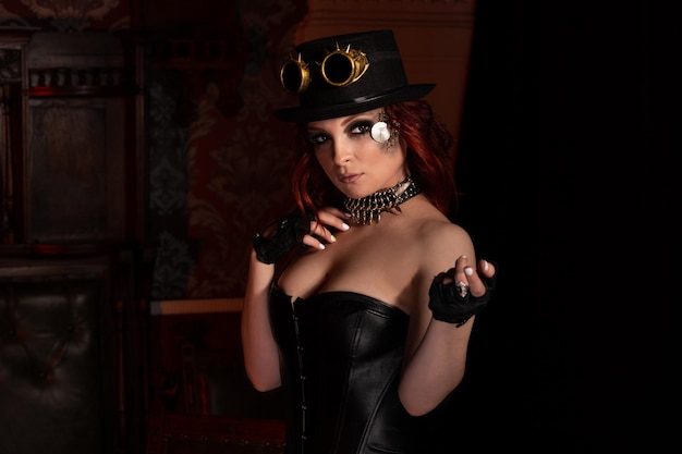 Steampunk girl Deep neckline hat round glasses and a gun on her finger