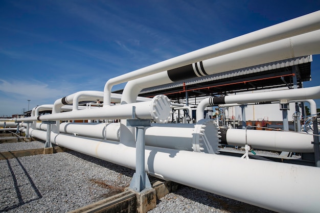 Steel long pipes and pipe elbow in station oil factory during refinery Petrochemistry industry in gas site distillery.